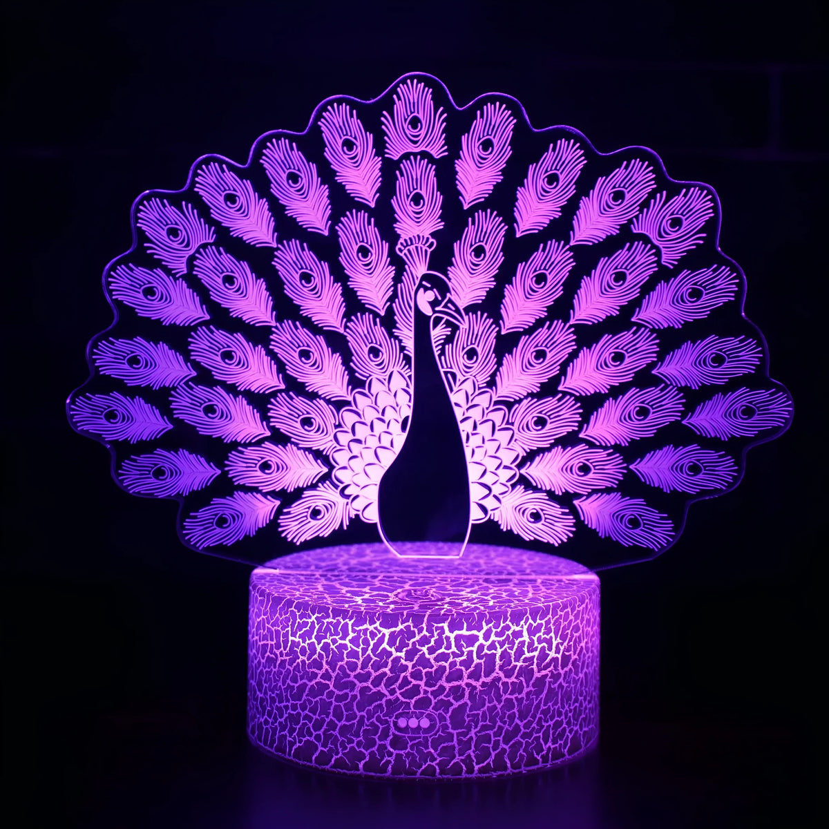 Small colourful 3D acrylic USB table lamp with touch control and crack-design base on a wooden desk.