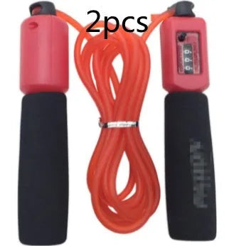 Adjustable length fitness skipping rope with sponge grip handles in multiple colour options