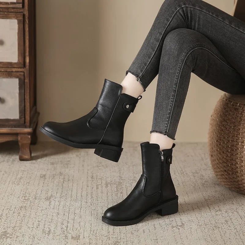 Women's black low heel ankle boots with side zip and round toe design