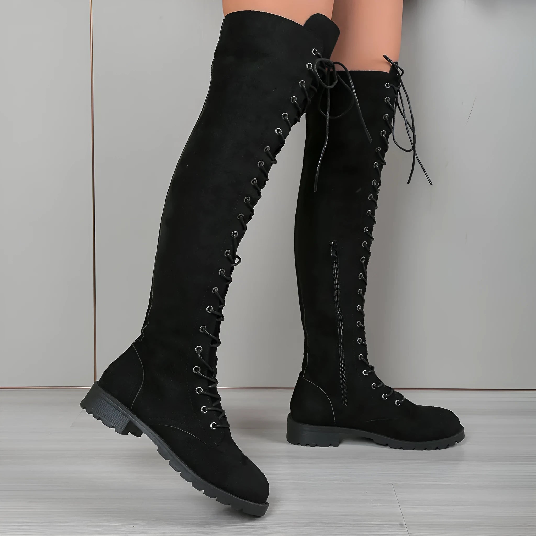 Women's black lace-up over-the-knee boots with round toe and flat rubber sole