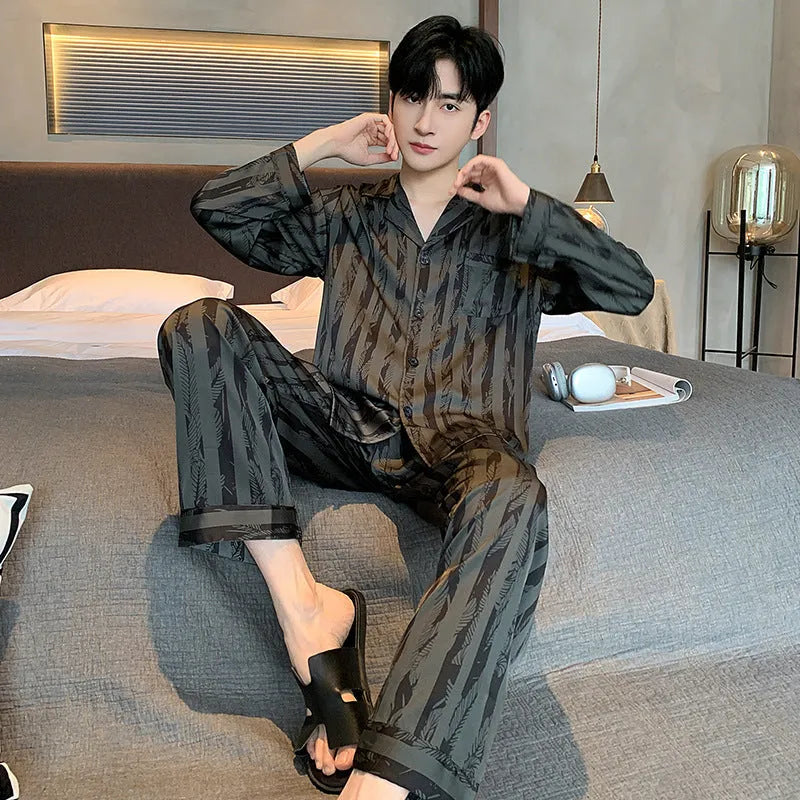 Men's black striped Ice Silk pajama set with long sleeves and trousers.