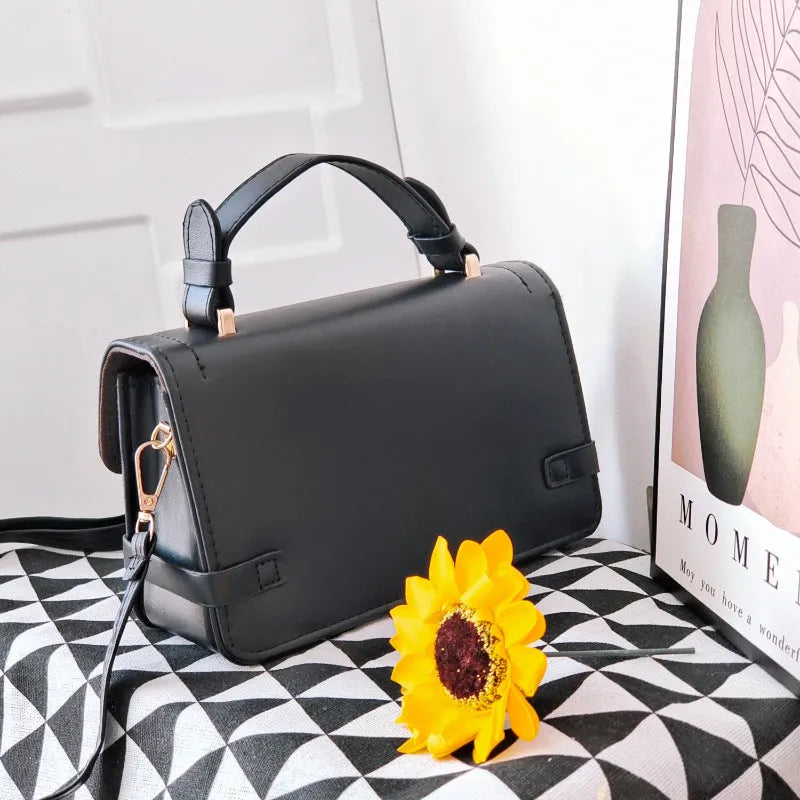 Square ethnic crossbody bag with floral stitching and plaid pattern design