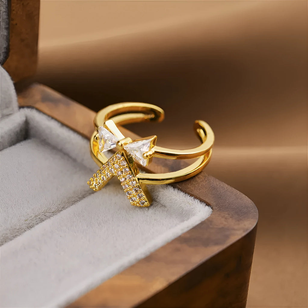 Gold geometric open adjustable ring on a plain background, Korean fashion jewellery style.