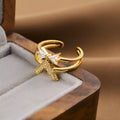 Gold geometric open adjustable ring on a plain background, Korean fashion jewellery style.