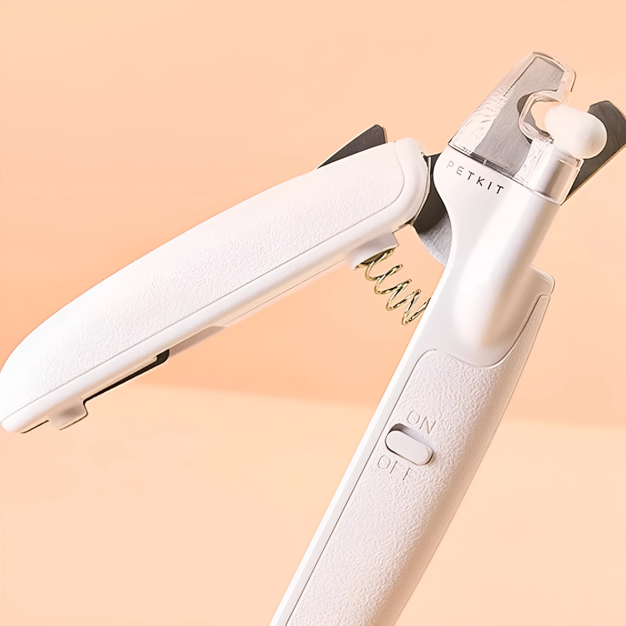 White pet nail clippers with LED light, anti-splash guard, and leather-like handle.