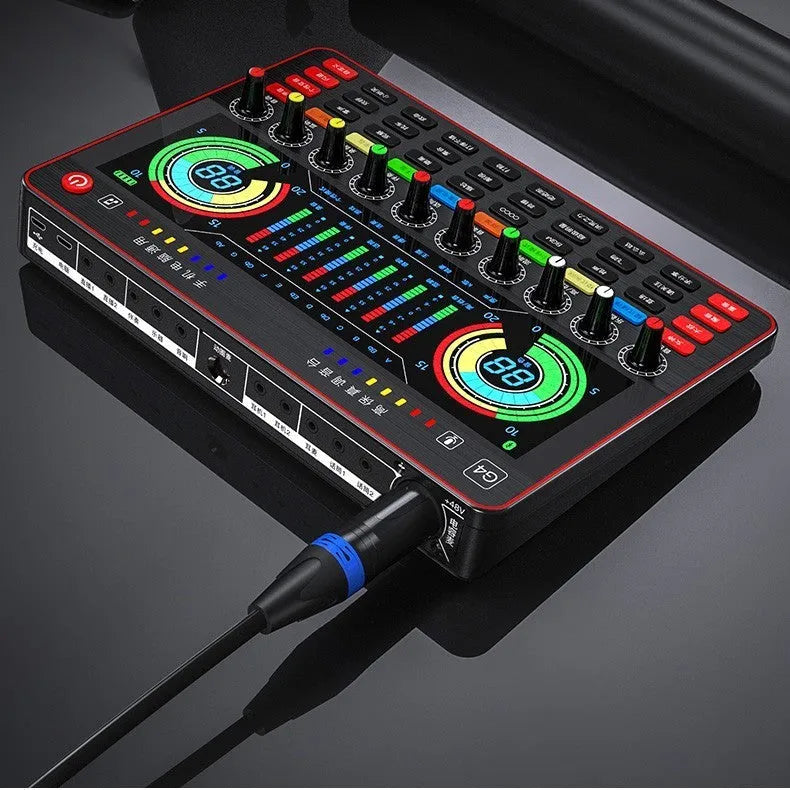 G4 professional USB sound card with LCD display, microphone, remote control and audio cables on a desk