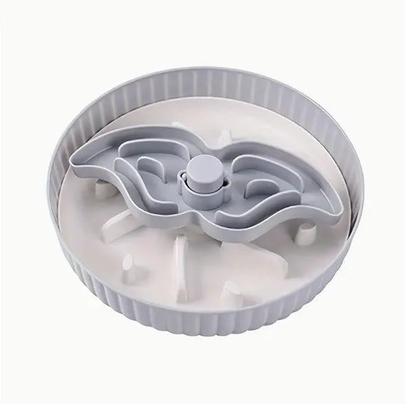 Pet slow feeder bowl with silicone licking mat in rotating game board design