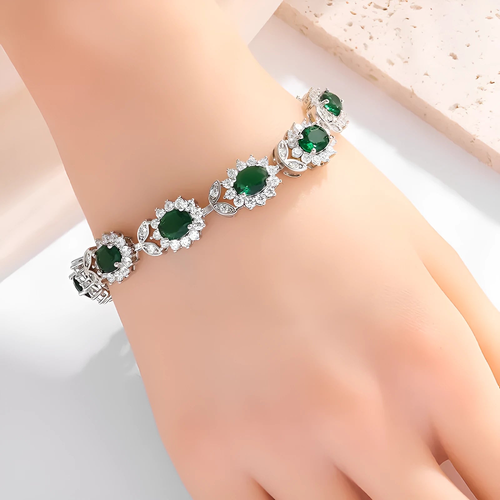 Women's simple bracelet with inlaid zircon gemstone on an electroplated environmentally friendly alloy band.