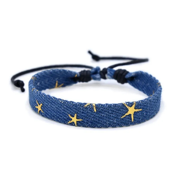 Denim fabric bracelet carrying strap with mixed materials and unisex design