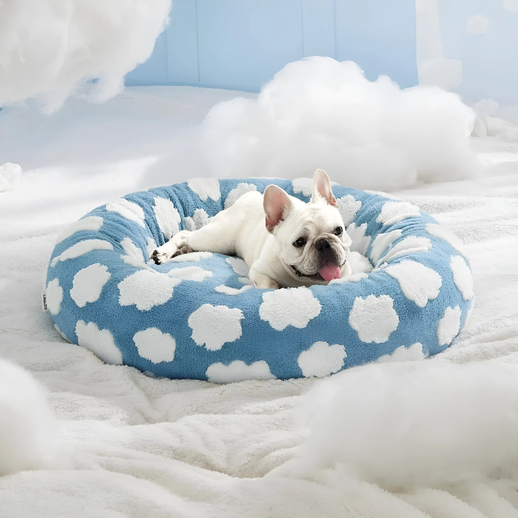 Round plaid dog bed with plastic base, shown in sea blue and white colour, with removable washable cover.