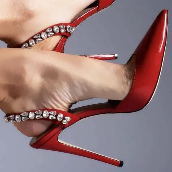 Women's black patent leather pointed toe high heel sandals with rhinestone details on the strap.