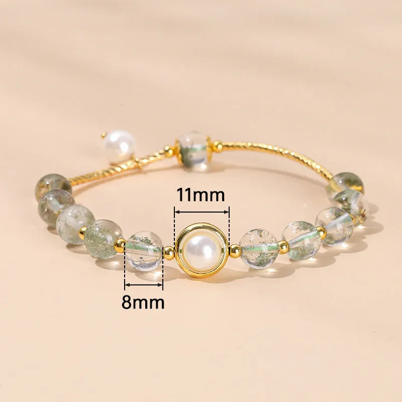 Handmade crystal agate bracelet with natural gemstone beads and a decorative charm