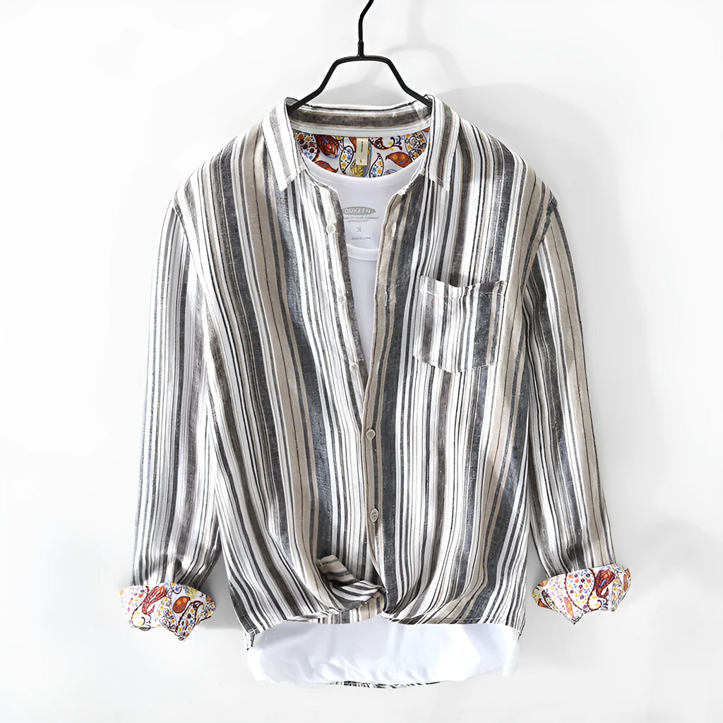 Man wearing a loose-fit red and grey striped linen long-sleeve casual shirt.