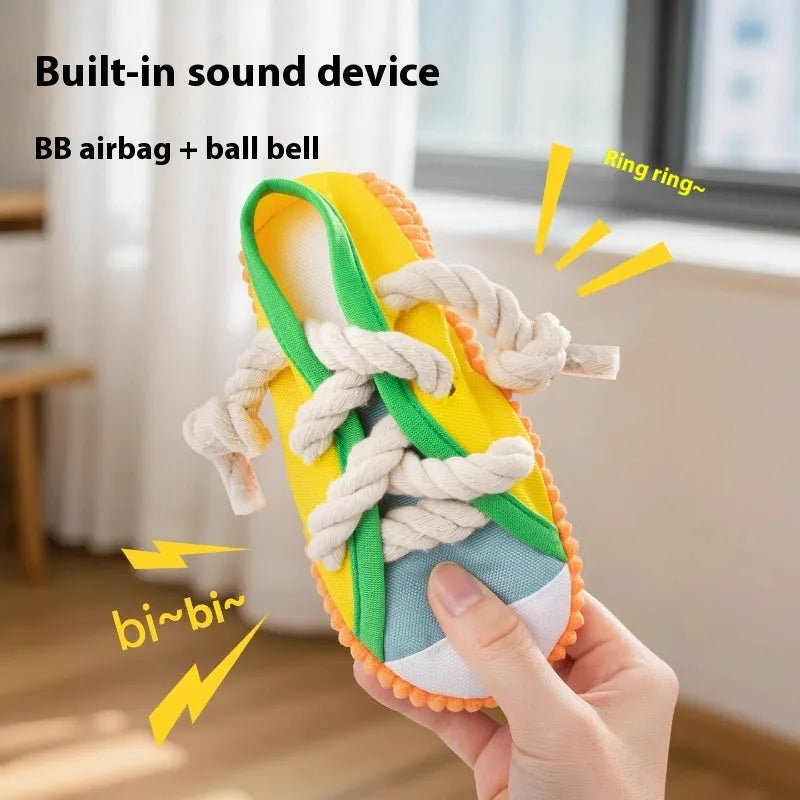 Squeaky plastic dog slipper chew toy in rock yellow, black and sea fog blue colours