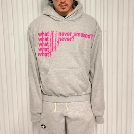 Black hooded sweater with white letter print design, showing front view with hood up