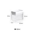 Transparent plastic food storage container with white lid for grains, showing 400ml capacity and clean Japanese design.