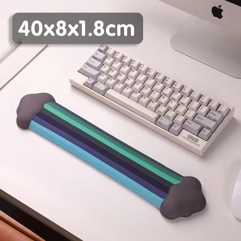 Silicone wrist rest mouse pad and matching keyboard support with cloud pattern design on desk