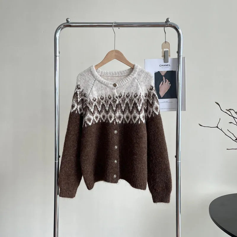 Women's loose fit jacquard knit sweater coat in milky white, shown on a hanger.