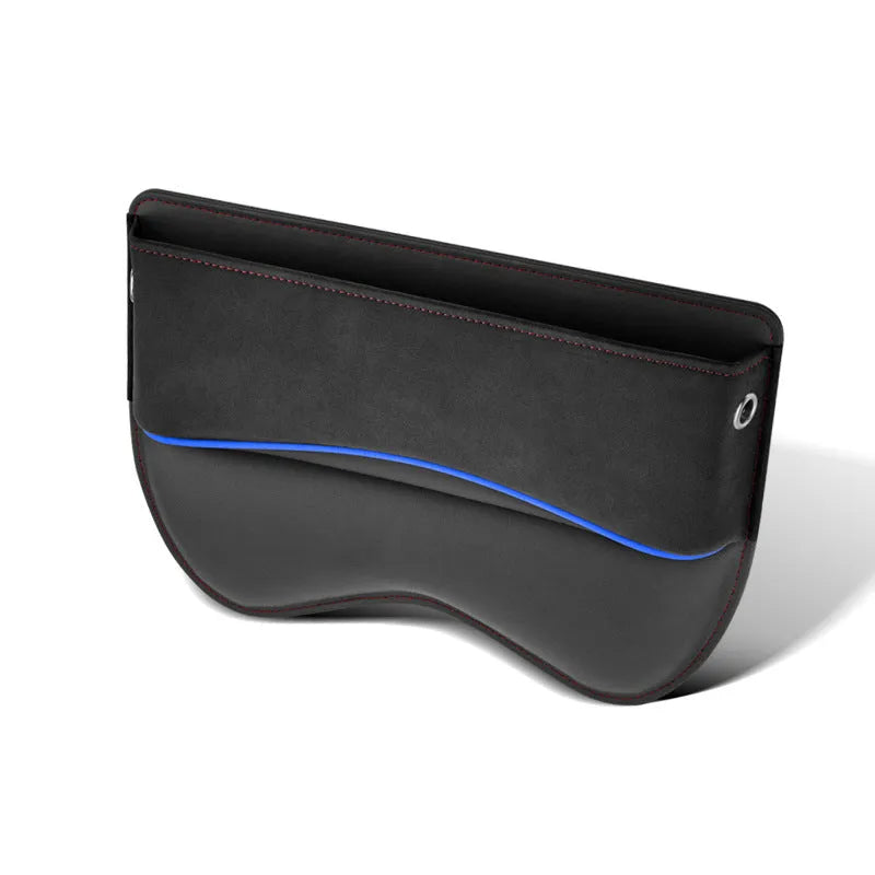 Leather car seat storage box in beige suede colour, shown on a car passenger seat.