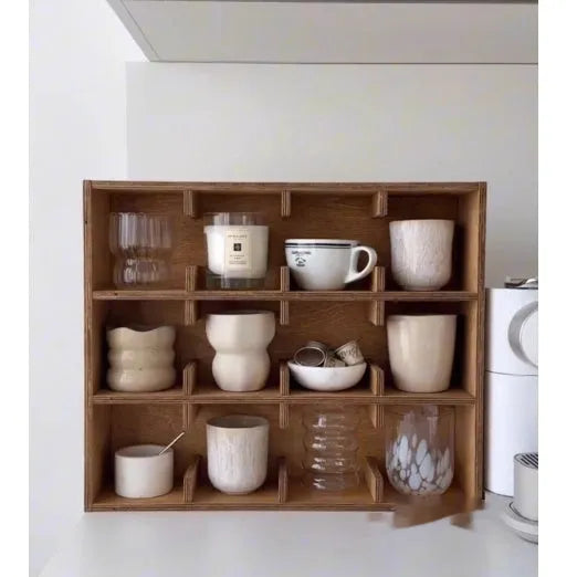 Solid wood square storage rack with multiple grid compartments in a birch wood meridian colour.