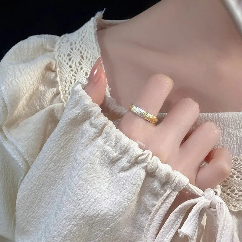 Traditional Xiangyun pattern white copper ring with electroplated silver gold finish and open mouth geometric design