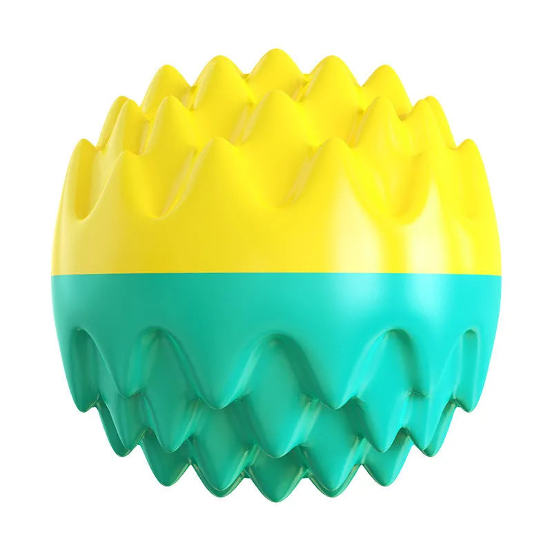 Blue and orange spiky rubber dog ball with squeaker for dental cleaning and water play