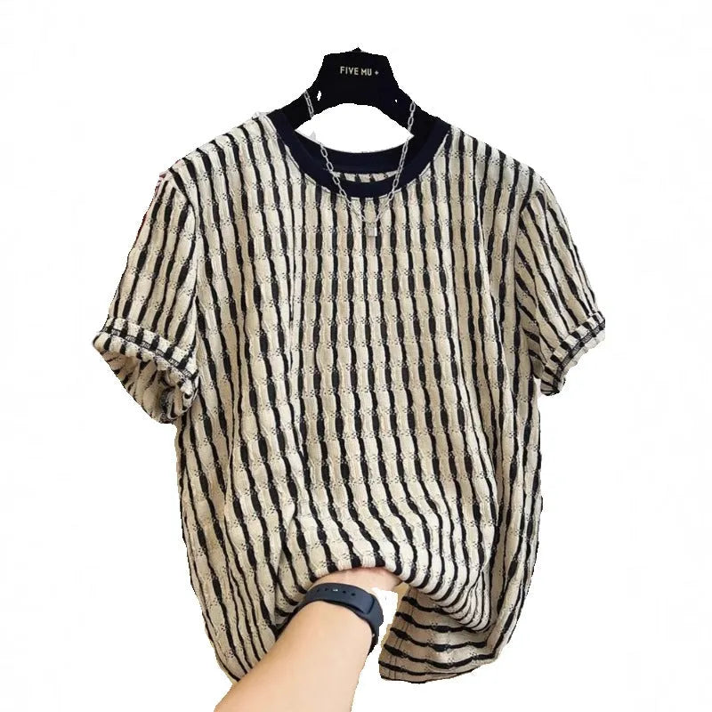 Black and white striped men's loose-fit short sleeve casual shirt made from linen blend fabric.