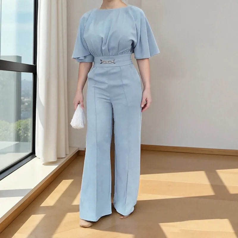 Blue men's polyester business suit with trousers and long-sleeved jacket on a hanger