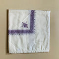 Printed square polyester scarf in a selection of colours, shown flat to display its 138x138 cm dimensions.