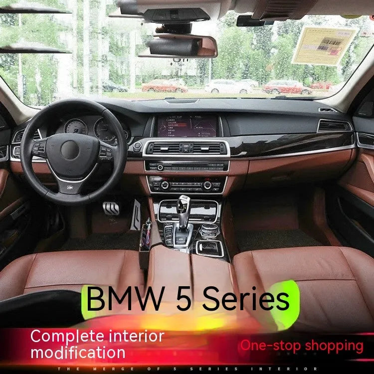 Four silver and black decorative trim strips for BMW 5 Series F10 model interior door handles.