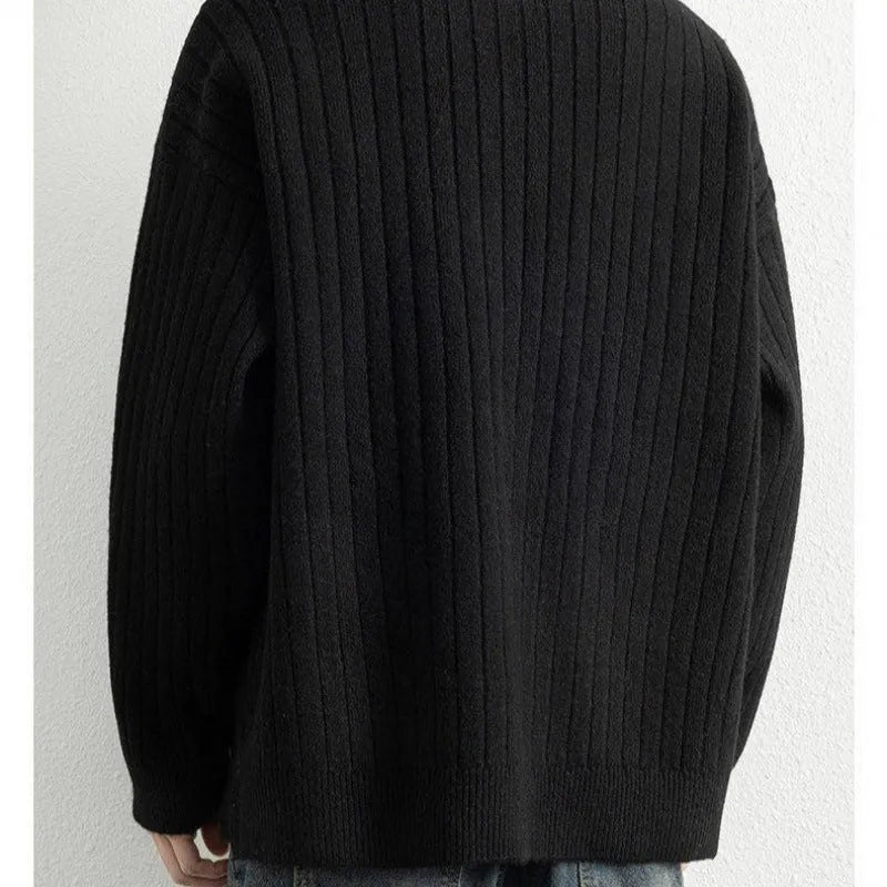 Men's grey half zip loose sweater with textured knit pattern and long sleeves