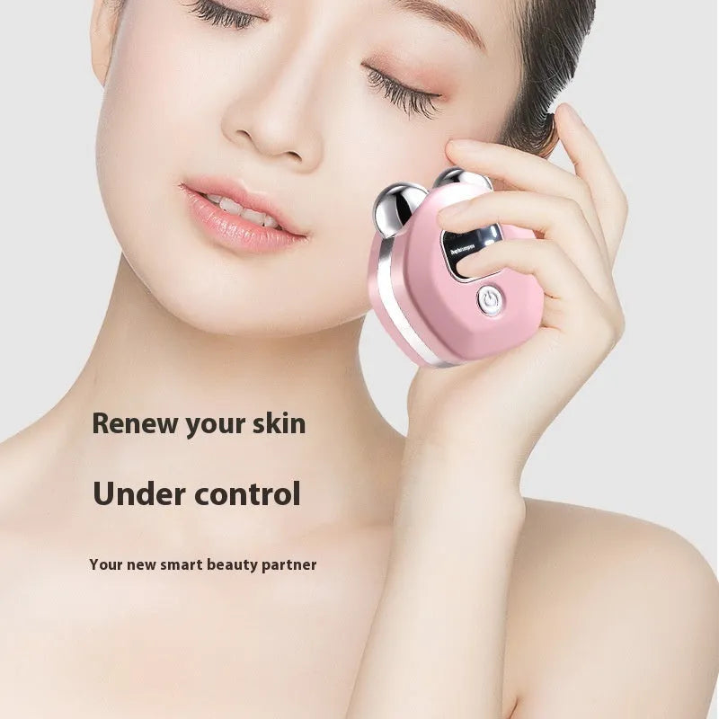 Portable hot compress charging facial massage instrument with double rollers in light blue colour