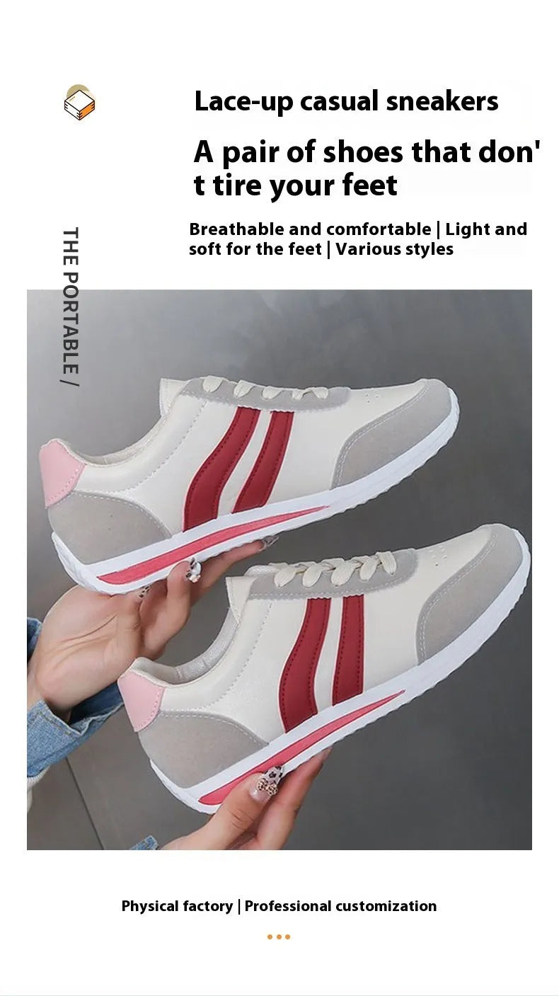 Blue and red low top lace-up leisure sneaker with a round toe and rubber sole.