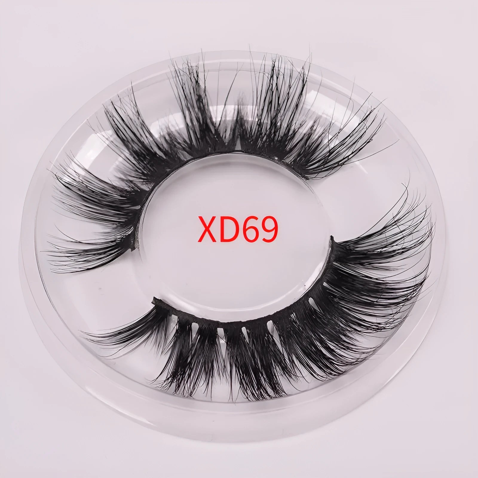Affectionate brand 5D mink false eyelashes set with storage case and brush on a white background.