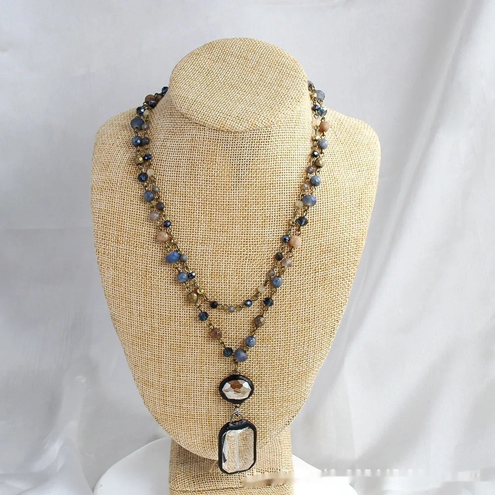 Tribal two-layer necklace with glass pendant and stone elements on adjustable chain