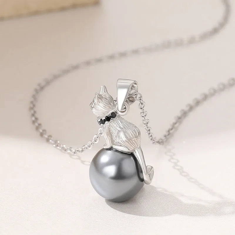 925 sterling silver cat pendant necklace with electroplated finish shown in pendant and necklace formats