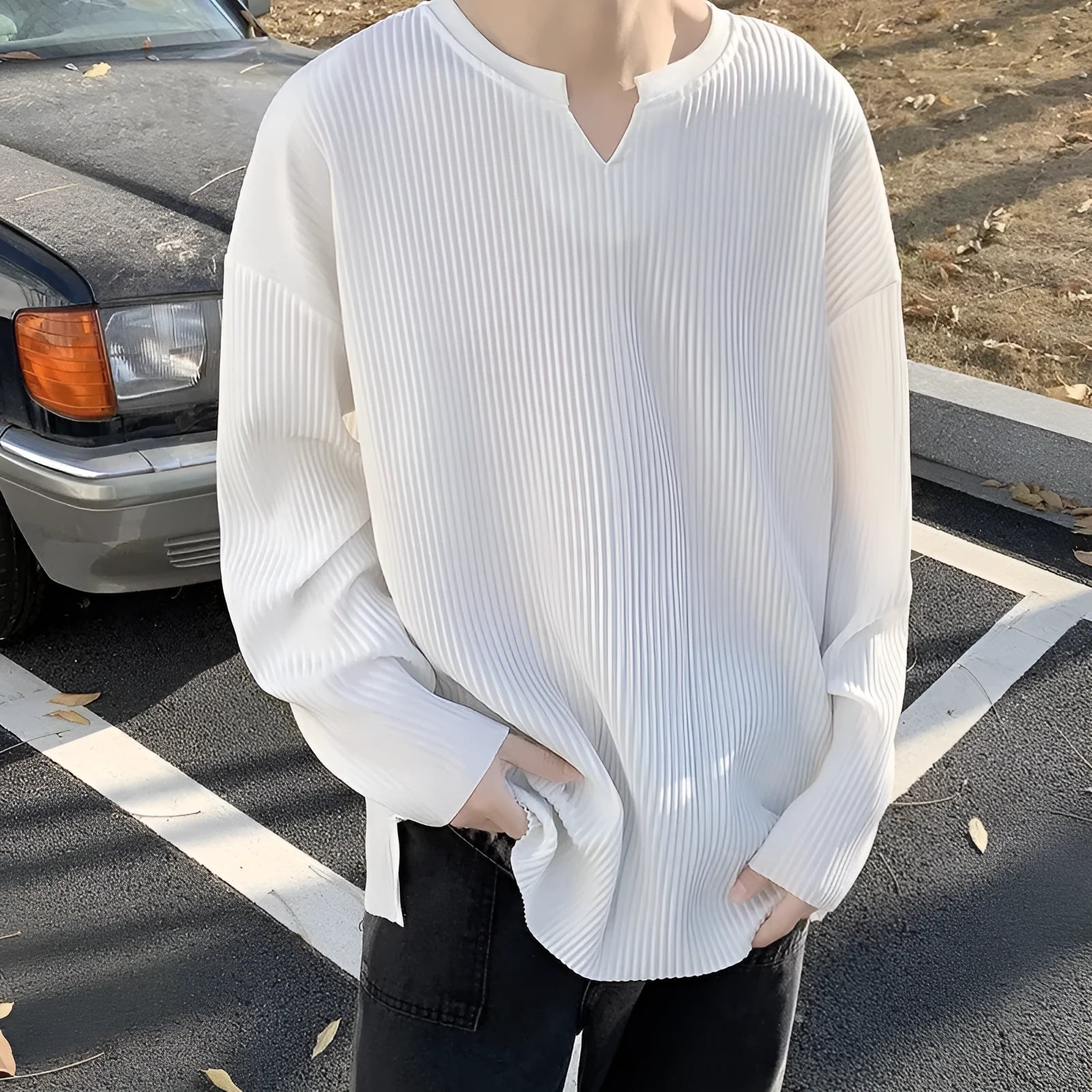 Plus size loose fit striped pullover sweater in black, grey or white.