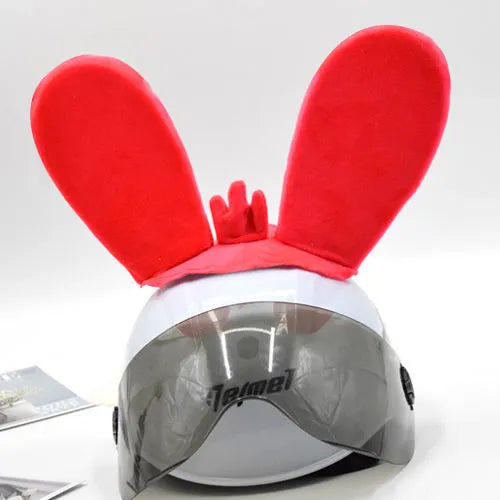 Rabbit Glow Ears helmet decoration with locomotive and ski designs on a Velcro base
