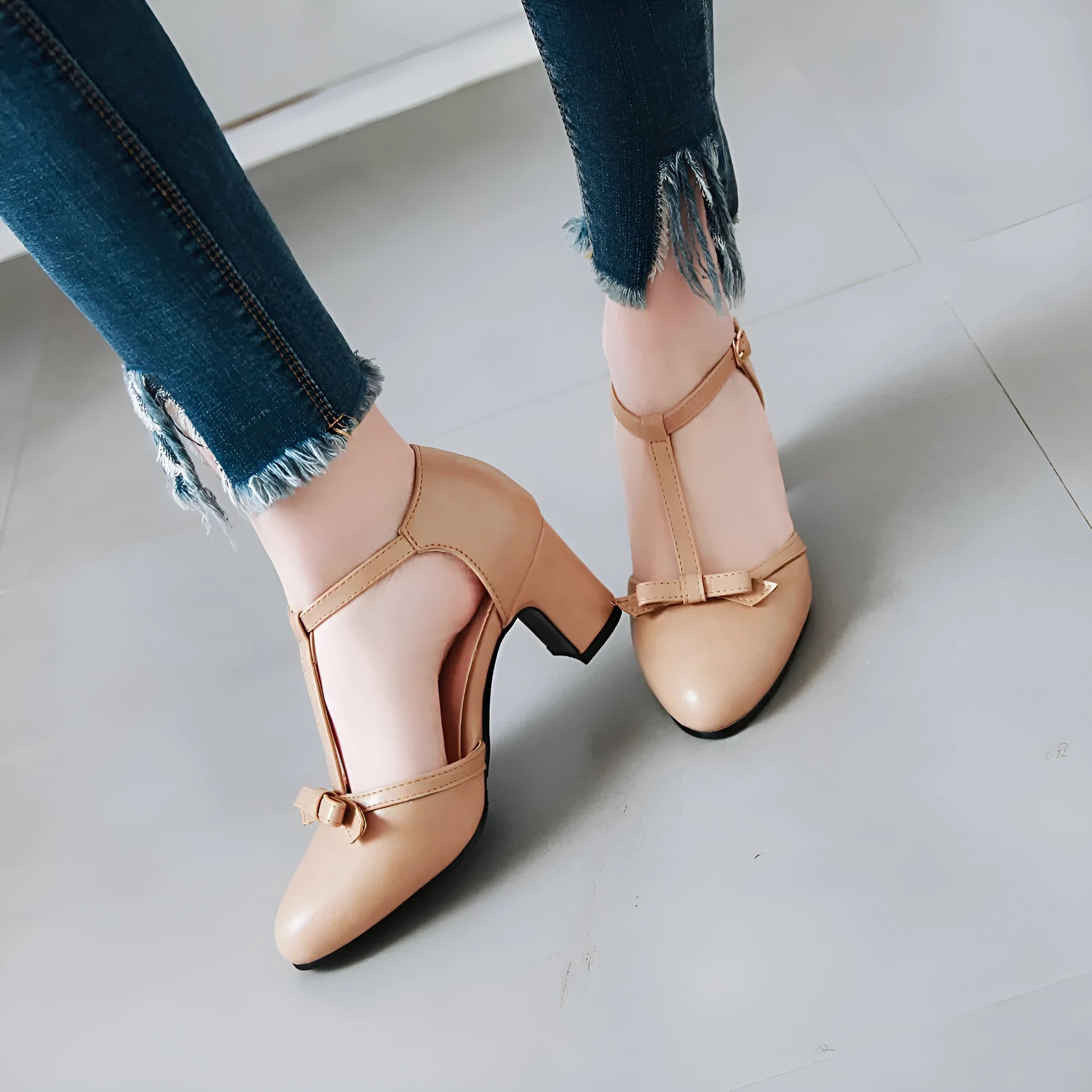Women's chunky heel sandals with adjustable buckle strap and bow detail