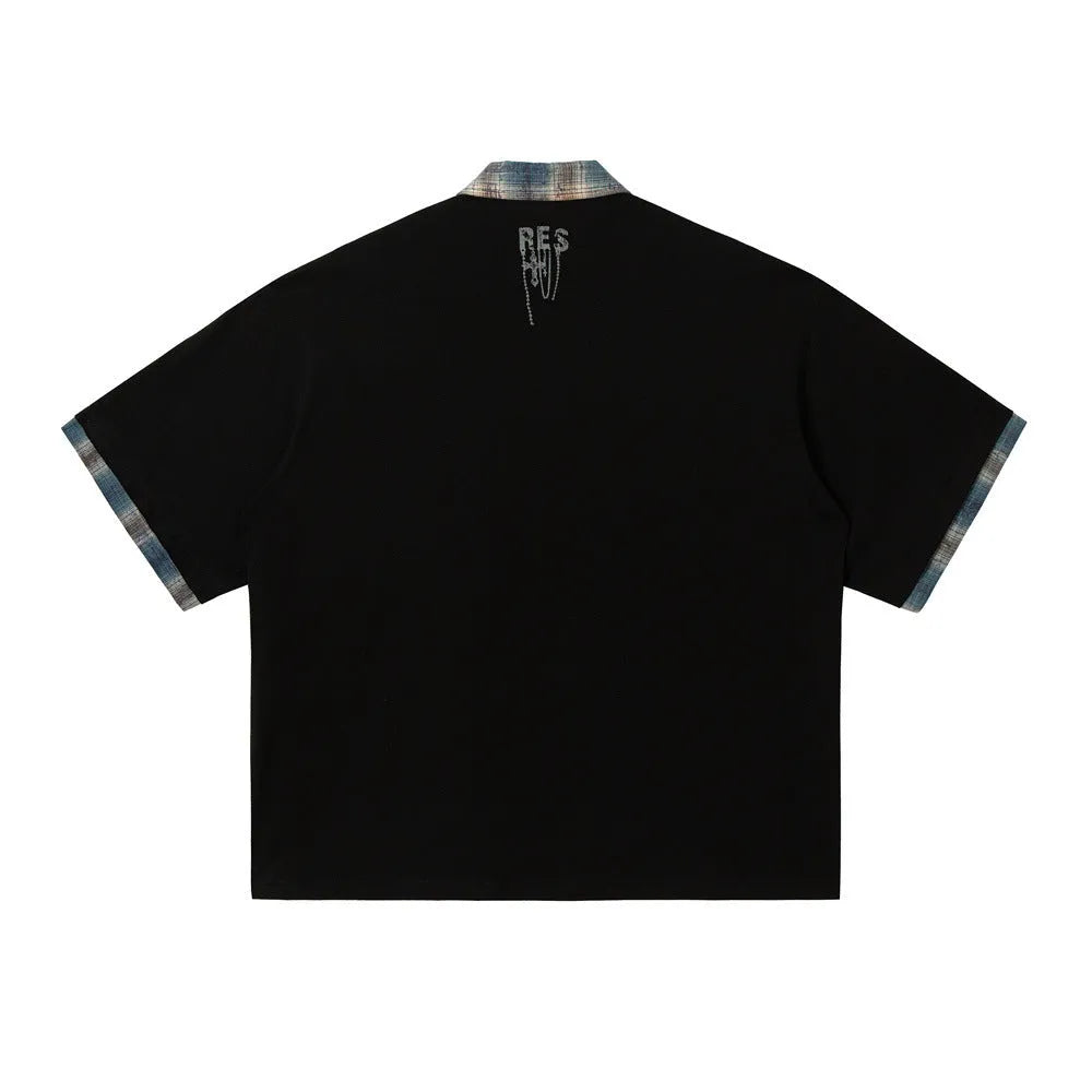 Men's loose blue short-sleeved cotton top with an asymmetric graffiti print design.