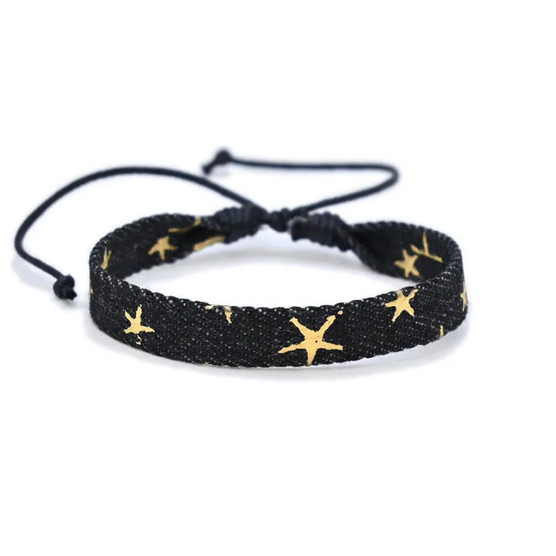 Denim fabric bracelet carrying strap with mixed materials and unisex design