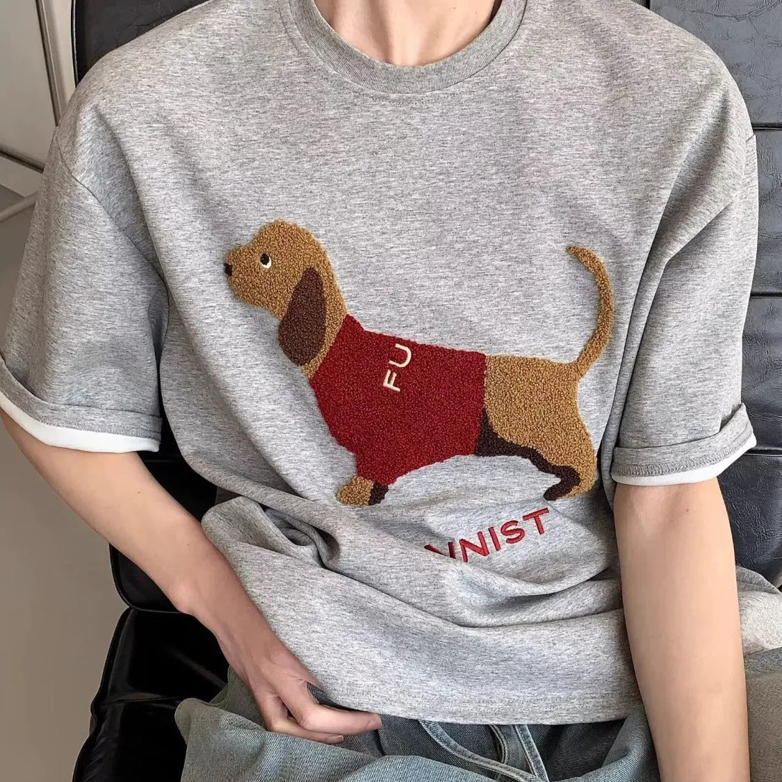 Men's grey T-shirt with embroidered sausage dog design on front, round neck and short sleeves