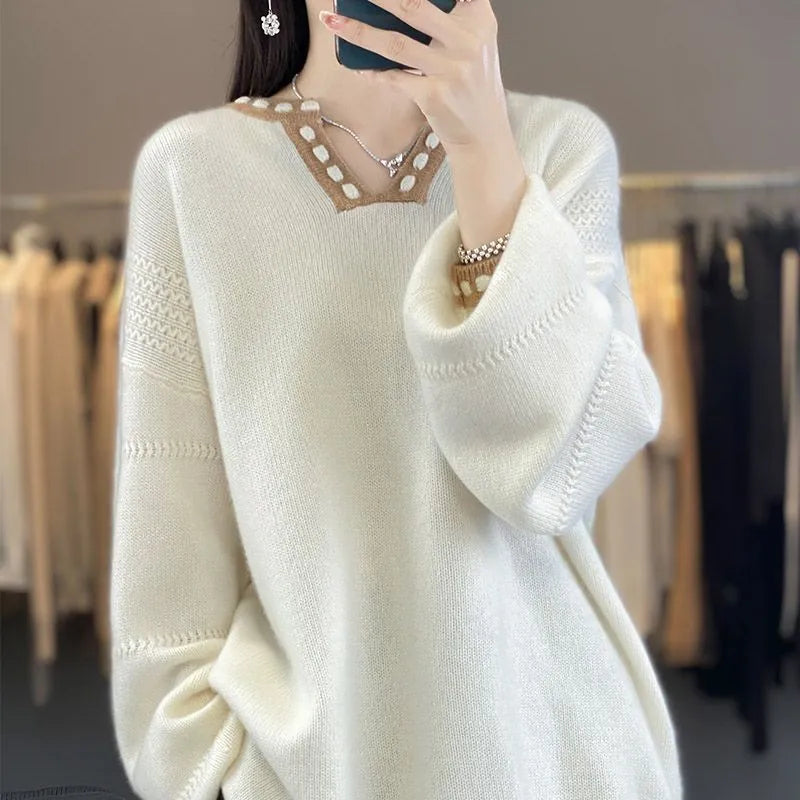 Women's camel coloured V-neck pullover sweater with long sleeves, made from viscose fibre.