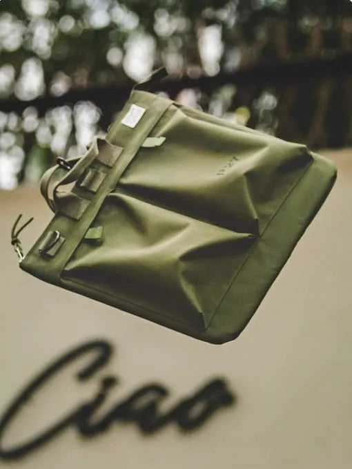 Marden Tooling Helmet canvas crossbody messenger bag in military green with laptop compartment