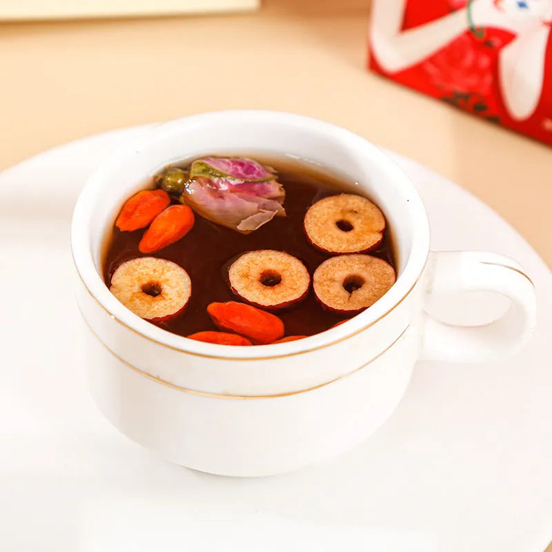 Box of Yuantang brown sugar ginger and red date herbal tea bags, 150g net weight.