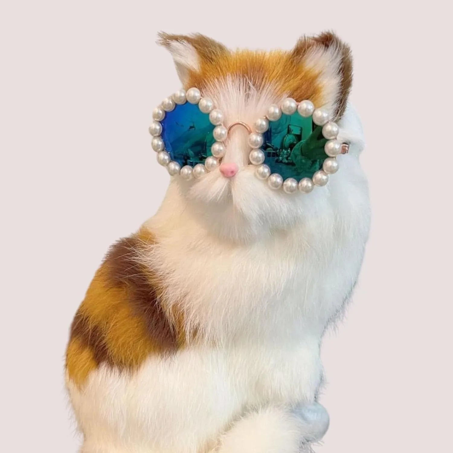 Round pearl sunglasses for a cat or dog, shown in blue on a neutral background.