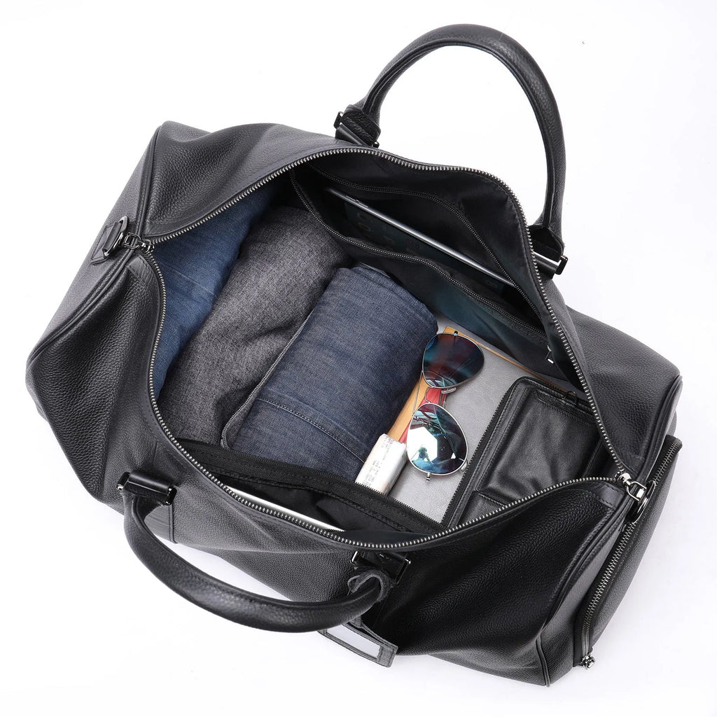 Men's black leather tote bag with single shoulder strap showing large capacity interior