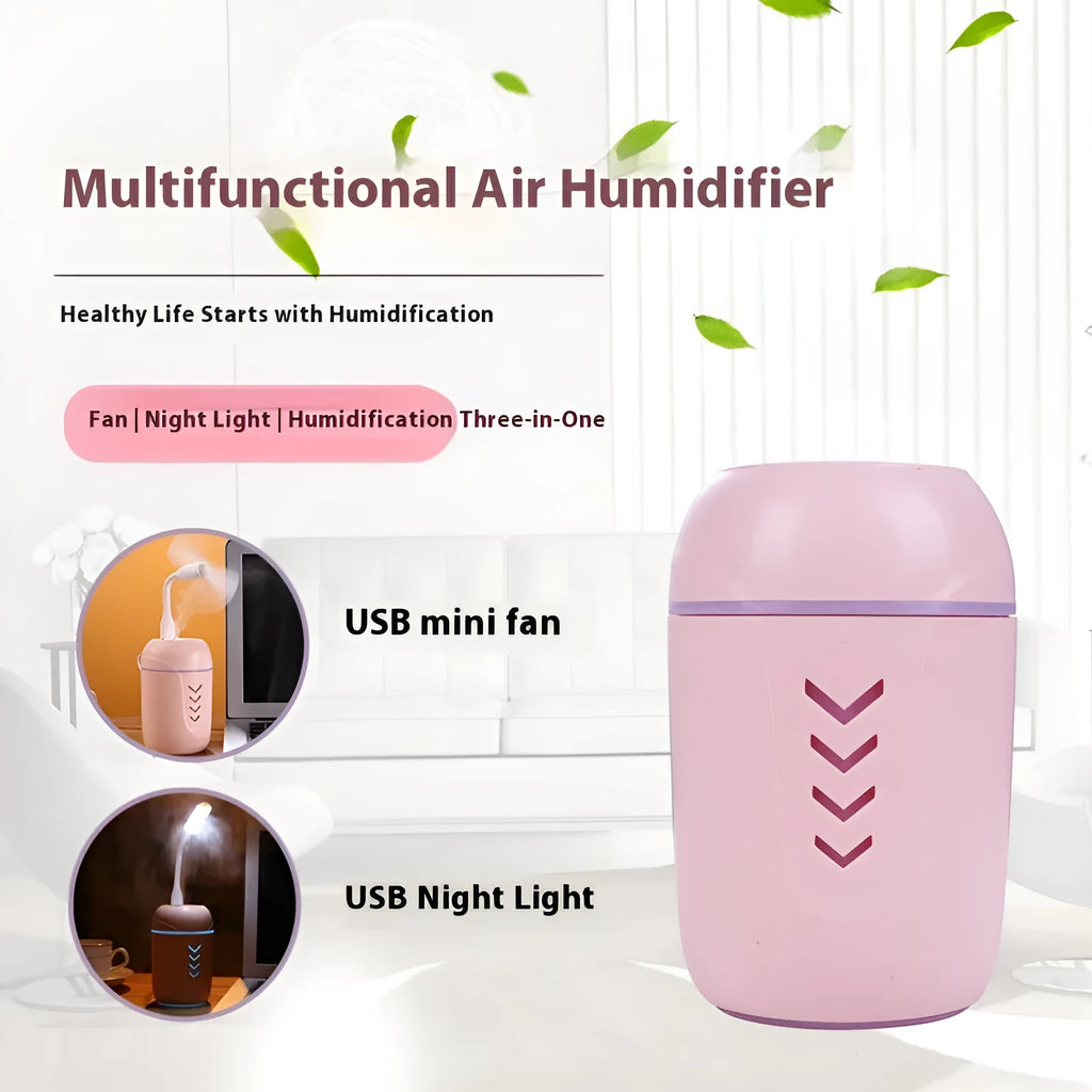 Round white portable USB air purifier on a wooden desk next to a laptop.