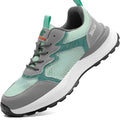 Green low-top work shoe with plastic toe cap, mesh panels, and slip-on design on a TPU sole.