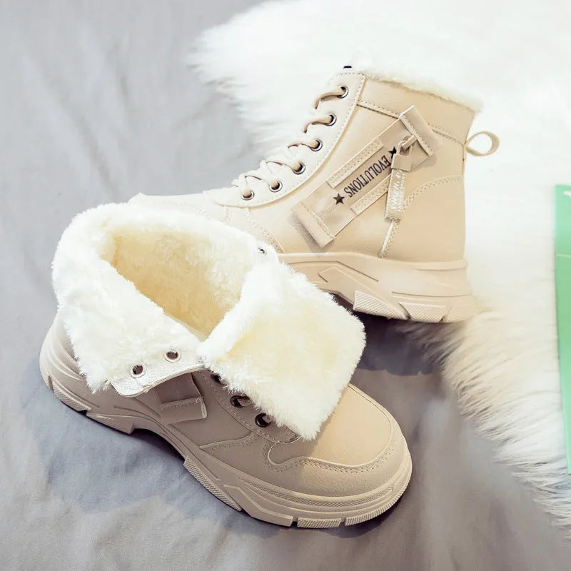 Women's plus size black snow boot with fleece lining and lace-up front on a rubber sole.